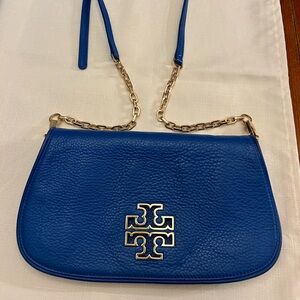 Tory Burch crossbody or clutch with removable straps.